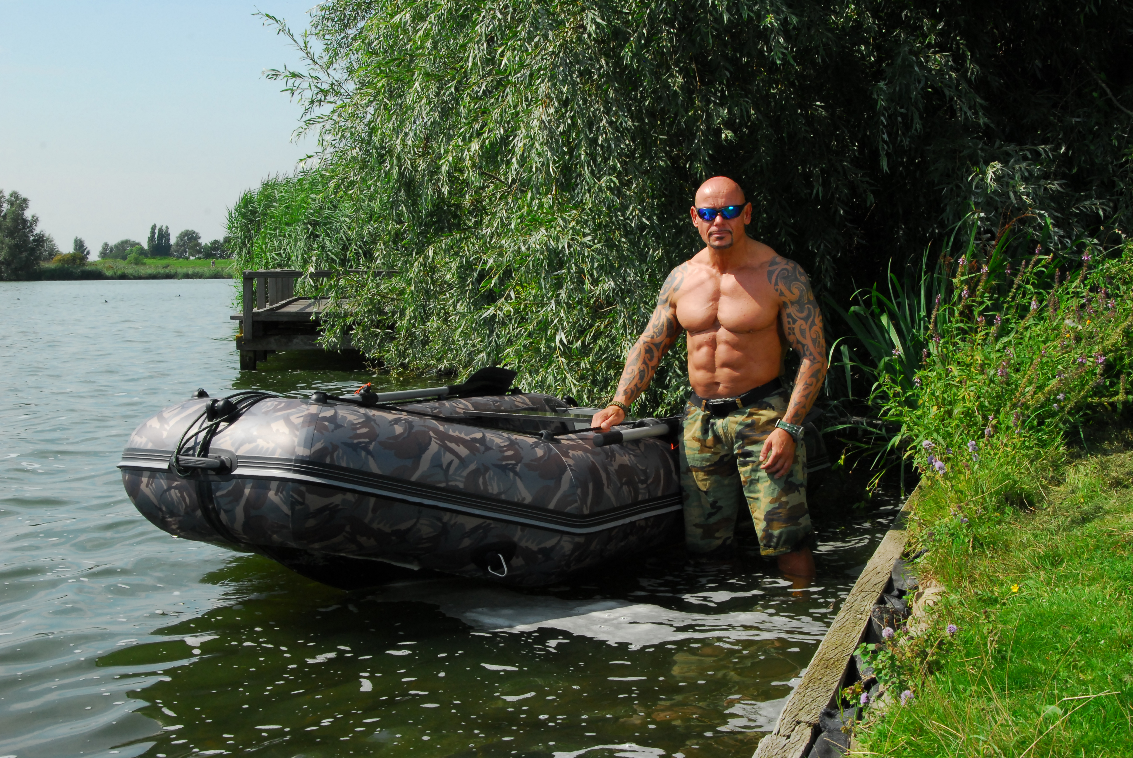 Ardy Veltkamp beside the water with his boat