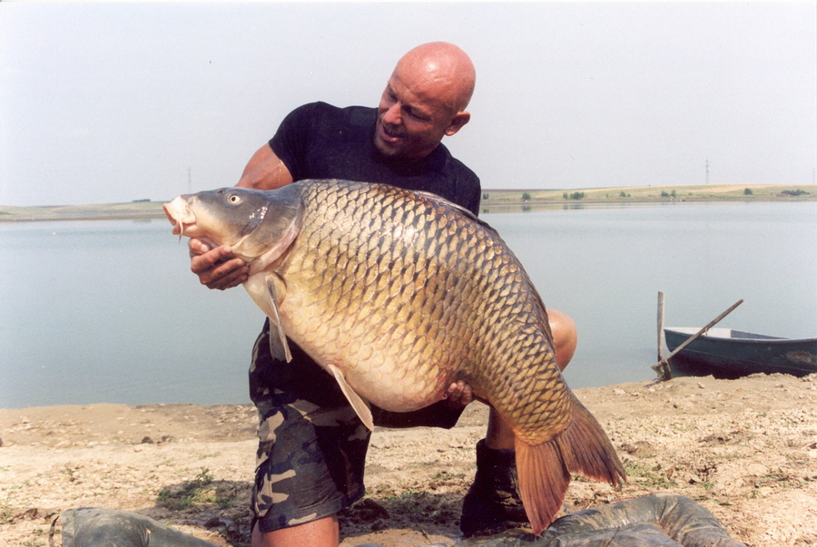 Ardy Veltkamp holding a large common carp